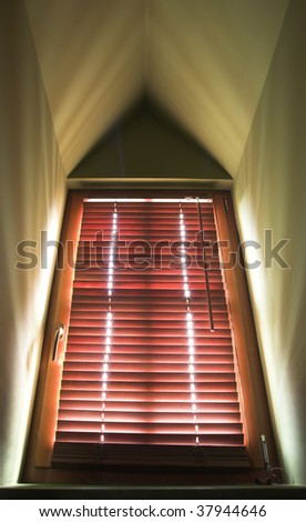 Dormer window with venetian blind