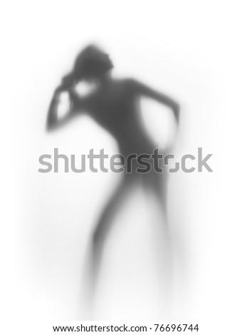 Nice woman pulls her hair, silhouette