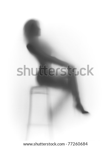 Sexy woman sits on chair, silhouette