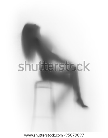 Beautiful woman sits on chair, silhouette