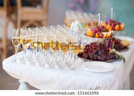 Holiday celebration. Champagne in glasses for wedding party. wedding champagne. wedding party table. wedding table. glasses of champagne