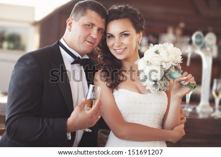 Bride and groom at wedding day. happy  newlywed man and woman at wedding party. Couple in lowe at wedding. Loving couple at marriage. happy wedding day. bride and groom outdoors. Funny wedding Series.