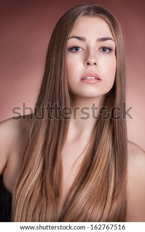Portrait of beautiful girl with perfect long brown hair, beauty woman with clean skin and natural makeup. studio shot isolated. Hairstyle. skin care. young beauty woman face. Straight Long Hair