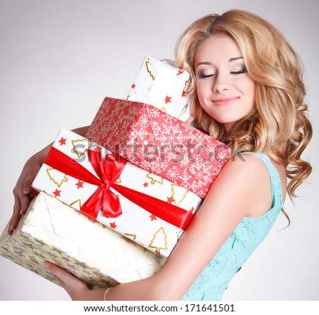 Happy Young Woman With Gift Boxes, Birthday Or Valentines Day Party. Beautiful Smiling Girl With Gift. Shopping Sales.Joyful Woman With Presents. Isolated, Studio, White Background.