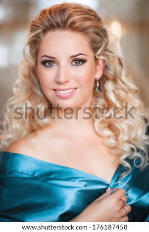 Beautiful young woman morning portrait lifestyle, pretty blonde girl at home at holiday morning, skincare and beauty model.