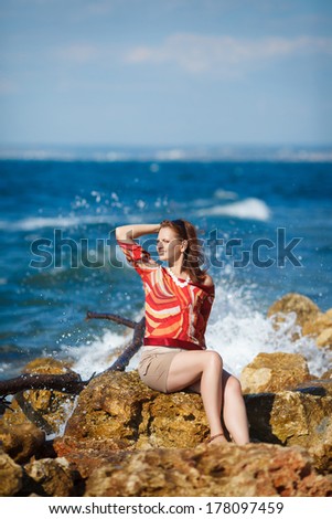 Happy young woman resting at beach at summer lifestyle portrait. Beautiful woman at sea vacation. travel. series