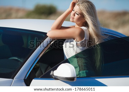 Sexy woman car, sensual blonde girl with luxury car outdoor portrait. young woman driver. series.