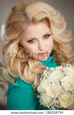 Beautiful young Bride outdoor, woman with wedding makeup and hairstyle retro style. Blonde bride with gorgeous curly hair at sunset - soft focus.