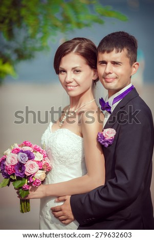 Beautiful Bride and Groom Wedding day outdoor, Newlyweds loving couple kissing, series
