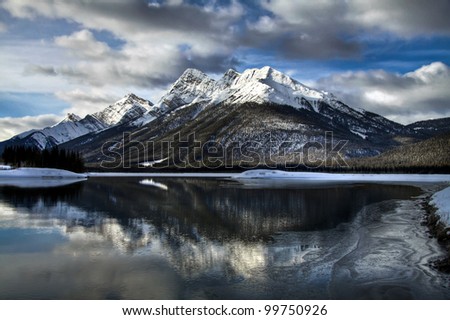 This is the View of Old Goat Mountain in Spray Valley Provincial Park, Alberta, Canada. From the edge of Old Goat Pond.