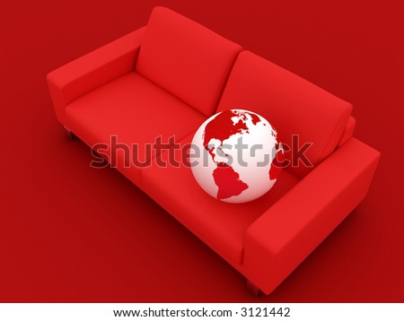 a red globe on a comfort red sofa