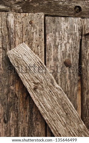Old wooden nailed boards as background