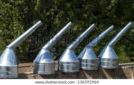 Variety of handmade tin funnels for sale