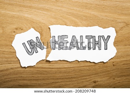teared paper with text healthy or unhealthy
