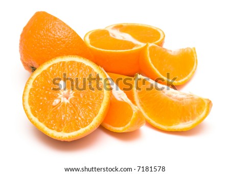 Fresh orange on white. The peel of fruit is covered by drops of water. Isolation, shallow DOF.