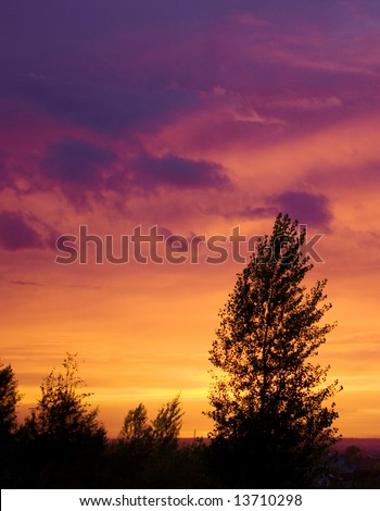 Wonderful sunset with the cloudy sky. Russia, Ural.