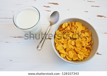 Sweet corn flakes and milk on the table