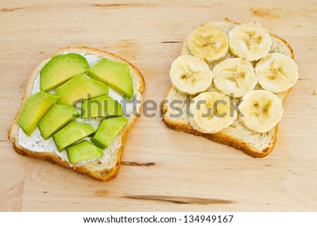 healthy sandwiches with banana, soft cheese and avocado