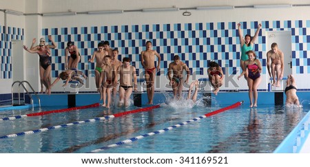 MINSK - AUGUST 31, 2015: Youth are testing swimming pool of the new leisure center Neptun in Minsk, Belarus
