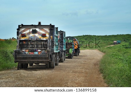 Garbage Trucks on their way to landfill
