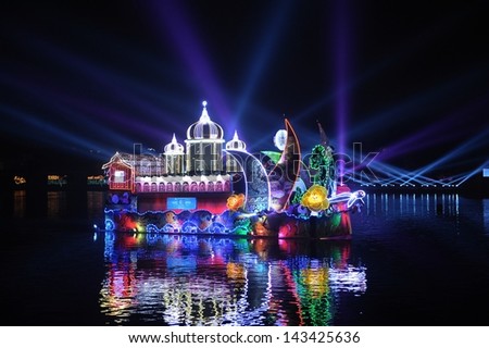 PUTRAJAYA - JUNE 24 : Boat parade called Magic of the Night are shown during Floria Event in Putrajaya, Malaysia in June 24, 2013.