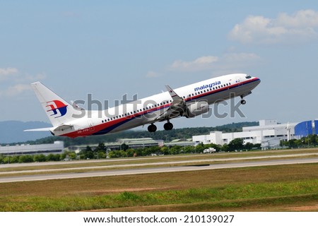 SEPANG, MALAYSIA - AUGUST 5: Malaysia Airline plane Boeing 737-800, Registration name 9M-FFD, take-off at KLIA airport on August 5, 2014 in KLIA, Sepang, Malaysia.