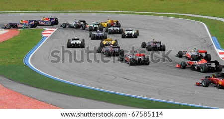 SEPANG, MALAYSIA - APRIL 4 : View of racing cars few second after start in Petronas Formula One 2010 at Sepang circuit. April 4, 2010 in Sepang, Malaysia
