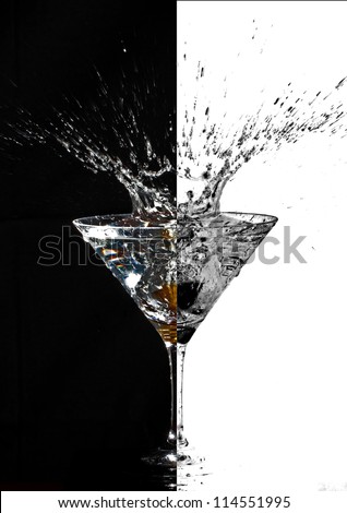 Olives Splashing in a Martini Glass