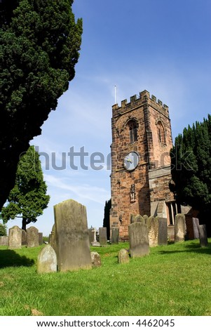 English country village church with graveyard