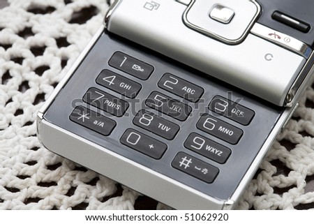 close up of slide out mobile phone keypad