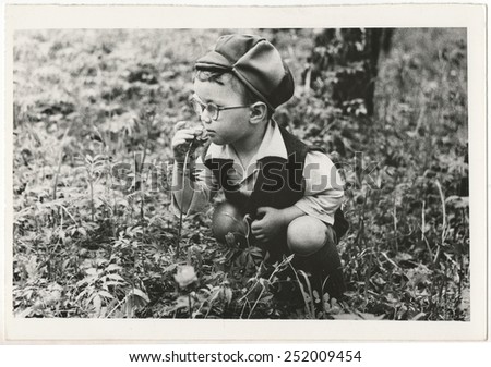 Od Soviet Black and white portrait photograph of a little boy. Old Black and white photographs.
