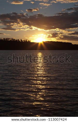 Lake sunset in summer evening