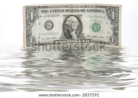 a one-dollar bill immersed in water showing CASH FLOW