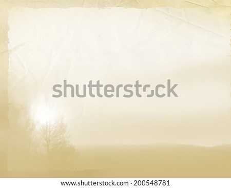 Old paper with landscape background. Page of the old book with woodland scenery, yellowed sheet of paper, faded background