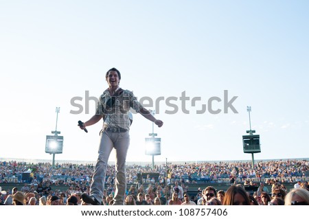WHEATLAND, CA - JULY 23: The Easton Corbin opens for Brad Paisley for The Escape Virtual Reality World Tour at Sleep Train Amphitheater in Wheatland, California on July 23, 2011