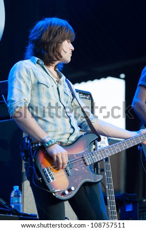 WHEATLAND, CA - JULY 26: Reid Perry of The Band Perry performs as part of Brad Paisley\'s Virtual Reality Tour 2012 at Sleep Train Amphitheatre on July 26, 2012 in Wheatland, California.
