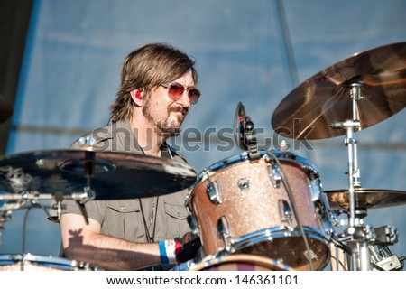 LINCOLN, CA - JULY 12: Robin Wilson of Gin Blossoms performs in Fun in the Sun Tour featuring Smash Mouth and Sugar Ray perform at Thunder Valley Casino Resort in Lincoln, California on July 12, 2013