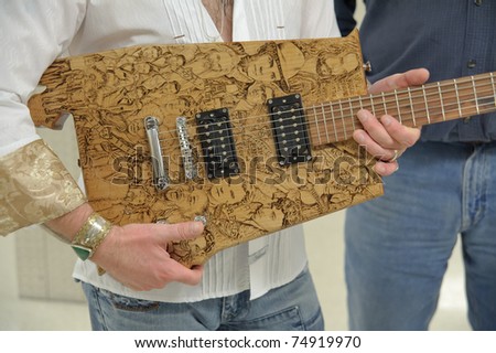 SACRAMENTO, CA - APRIL 8:  Bo Bice shows off his new customer guitar made by Woodshop Rocks at Thunder Valley Casino on April 8, 2011 in Rocklin, CA