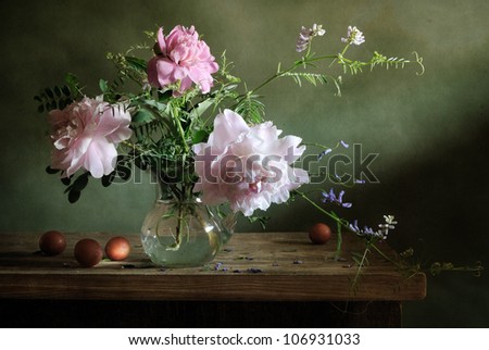 Still life with a bouquet of peonies and apricots