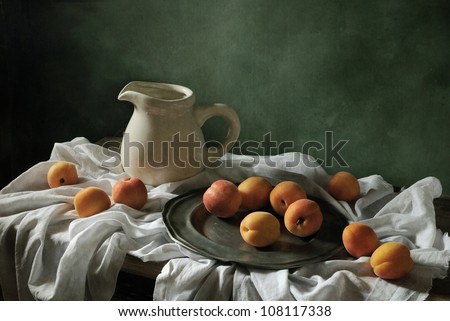 Still life with drapery and apricots