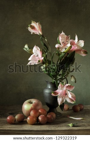 Still life with alstroemeria and fruit