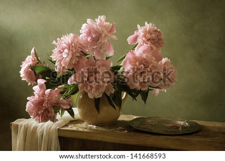 Peonies and a tin plate