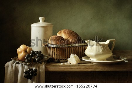 Still life with bread and porcelain