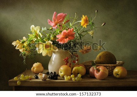 Beautiful still life with flowers and fruit