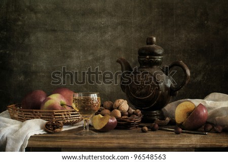 Still life with apples and nuts