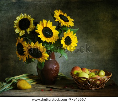 Still life with apples and sunflowers