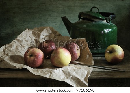 Still life with red apples and a very old kettle