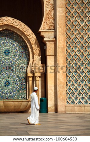 Muslim worshiper during holiday near the Hassan II Mosque in Casablanca Morocco Muslim worshiper during holiday near the Hassan II Mosque in Casablanca Morocco