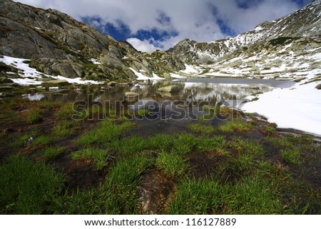 Late summer snow melting, Retezat mountains, Romania
