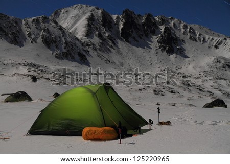 Camping at night in winter time, Retezat mountains, Romania